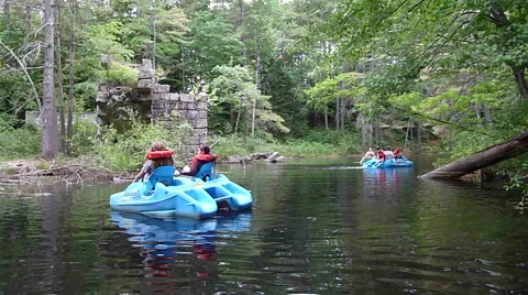 Pedal boats on River Stock Footage 42907209