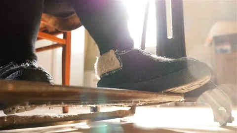 The pedal of the sewing machine. Close-up of legs. Slow motion Stock Footage 89098726