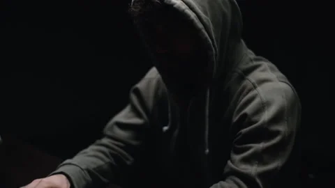 Pedestal shot of hacker man hacking web site or engaging hacking into security Stock Footage 145122180