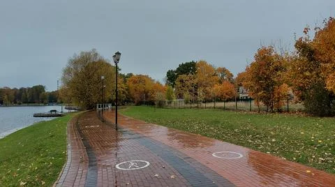Pedestrian and bicycle path in cloudy weather Stock Photos