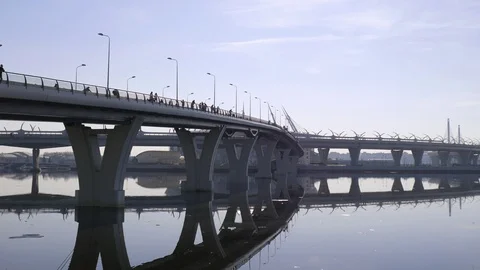 Pedestrian bridge across the river Stock Footage 106021309