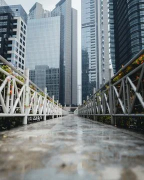 The pedestrian bridge is empty after the rain Stock Photos