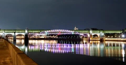 The pedestrian bridge over the river. Stock Photos