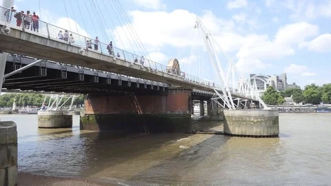 Pedestrian bridge on the river Thames. Stock Footage 76976116