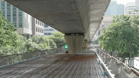 A pedestrian bridge under construction in downtown Bangkok, Thailand Stock Footage 245008320