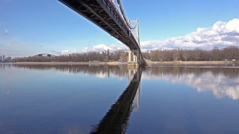Pedestrian Bridge under the River Dnieper with Clear Blue Sky Stock Footage 74194856