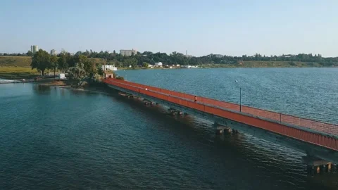 Pedestrian bridge in the urban-type settlement Sergeevka. Stock Footage 173944190