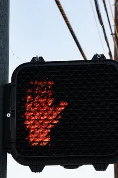 A pedestrian cossing light indicating do not walk, by red hand Stock-Fotos