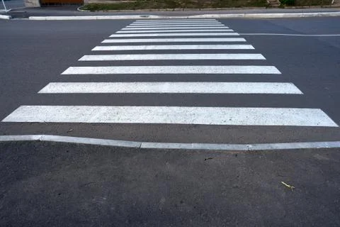 Pedestrian crossing on an empty road without cars. Stock Photos