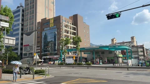Pedestrian Crossing Major Urban Intersection Near Subway Station in Seoul Video stock 342271484