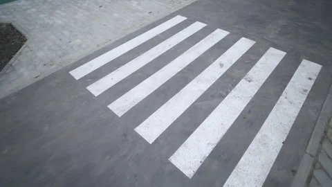 Pedestrian crossing marking painted on asphalt surface Stock Footage 330282969