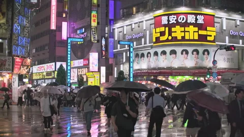 Pedestrian crossing with Neon light from billboards and advertisement in nightli Stock-Footage 244054853