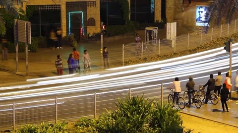 Pedestrian crossing at night street, people gather on roadside and pass together Video stock 59806267