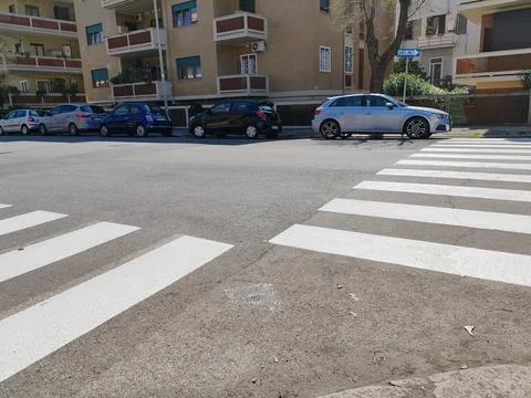 The pedestrian crossing at a road intersection Stock Photos