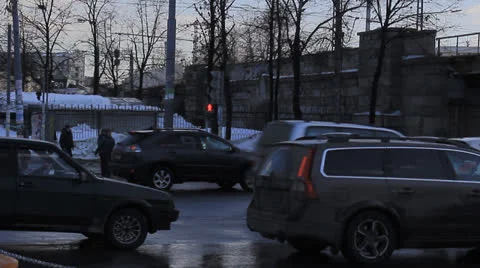 Pedestrian crossing the road at a red light Stock Footage 24241773