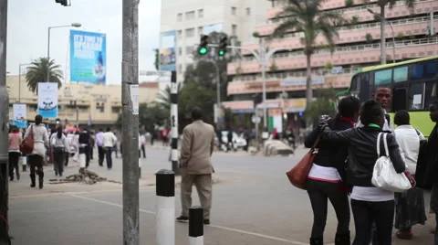 Pedestrian crowd walk in busy intersection, Nairobi city center, Kenya, Africa Video stock 52114753