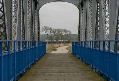 Pedestrian path through the ancient bridge. Stock Photos