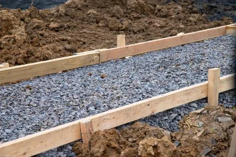 Pedestrian pathway construction in progress lumber guide rails secured with s Stock Photos