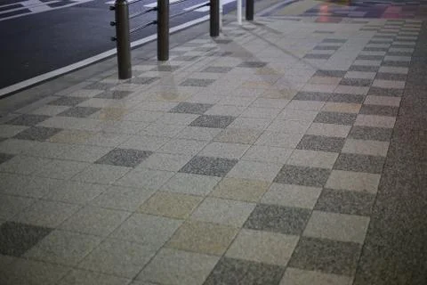 Pedestrian pavement design with random dot of square light brown and multiple Stock Photos