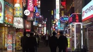 Pedestrian People Walking In Famous Commercial Narrow Street In Seoul Neon Sign Stock Footage