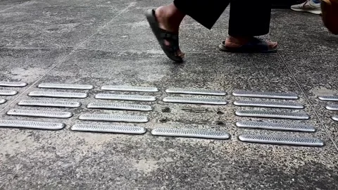 Pedestrian on the sidewalk Stock Footage 309872032