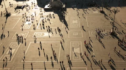Pedestrian silhouettes on a big square in the sun Stock Footage