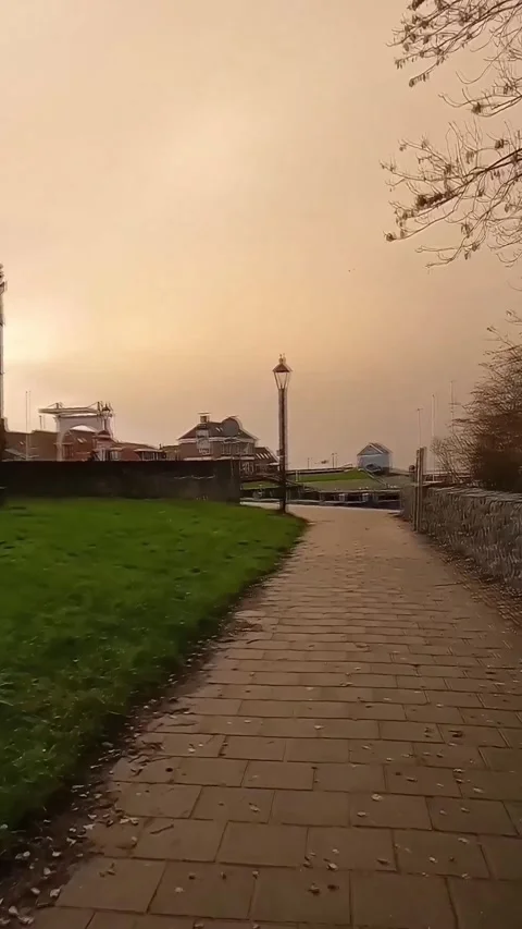 Pedestrian stone pathway and rustic rock wall in the Netherlands. 스톡 동영상 344319293