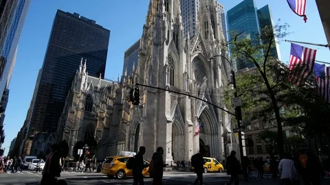 Pedestrian traffic in front of Saint Patrick Church Stock Footage 81445618