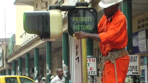 Pedestrian traffic light cleaning Stock Footage 80854322