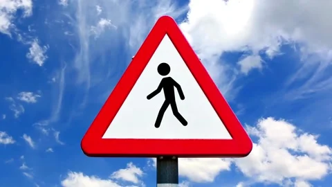 Pedestrian traffic road sign on the post, having a silhouette person, Stock Footage 313351982