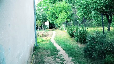 Pedestrian walk by the house Vídeo Stock 97501337