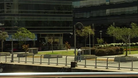 Pedestrian walk way between modern buildings. Stock Footage 160280617