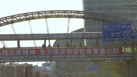 Pedestrian walking on overhead bridge in Beijing city Stock-Footage 88832876