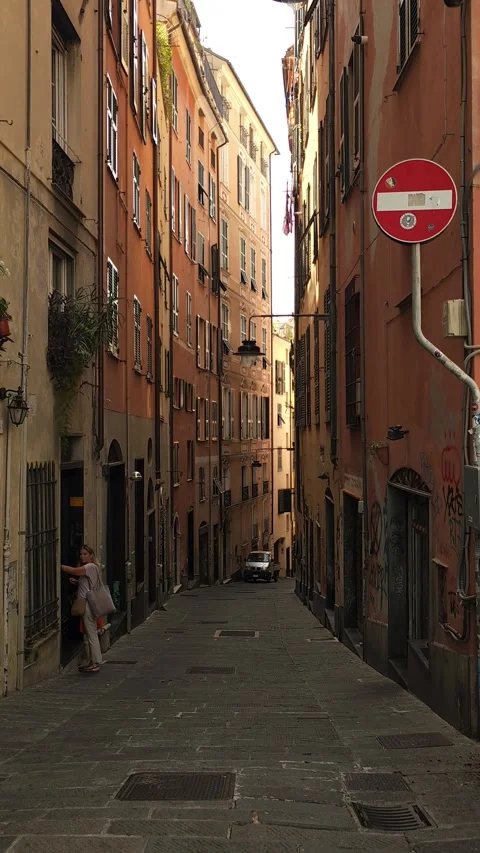 Pedestrian Walking Through Narrow Historic City Street Stock Footage 342751685