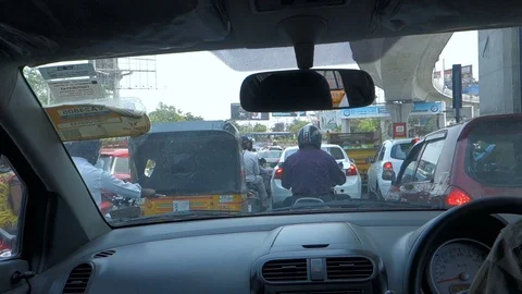 Pedestrian walks through traffic jam india Stock Footage 87506470