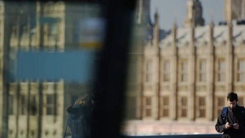 Pedestrian on Westminster Bridge Stock Footage 128164598