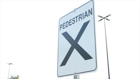 Pedestrian x vertical rectangle sign in black writing on white background Stock Footage 251371019