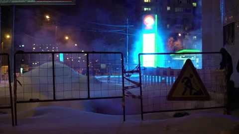 The pedestrian zone is undergoing renovation work and a fence and a road sign Stock Footage 146409776