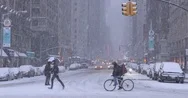 Pedestrians And Traffic On The Streets Of Manhattan In A Blizzard Stock Footage