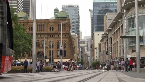 Pedestrians and tram pass through the centre of Sydney slow motion 4K Video stock 159064032