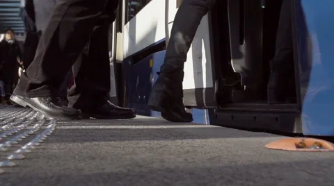 Pedestrians at a bus station Stock Footage 48243050
