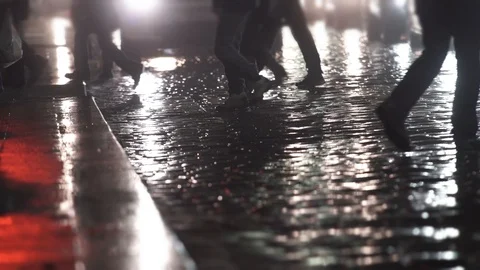 Pedestrians on cold winter night, cross busy city street, slow motion Stock Footage 118990366
