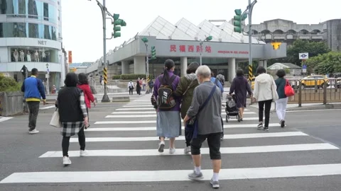 Pedestrians Crossing and Street Scenes in Taipei, Taiwan 4 Stock Footage 245076341