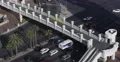 Pedestrians Crossing Bridge Las Vegas Boulevard Strip Busy Street Cars Passing 4k or 4k+ Resolution