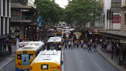 Pedestrians crossing at the intersection between Adelaide street and Stock Footage 219626754