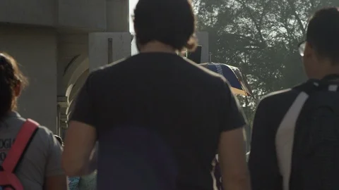 Pedestrians crossing street Stock Footage 120043653