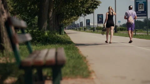Pedestrians on Lakeside Path at Jarun Stock-Footage 337263323