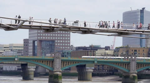 Pedestrians on the Millennium Bridge Stock Footage 51544564