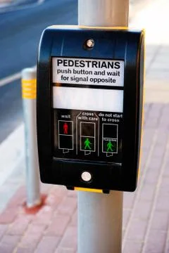 Pedestrians push button Stock Photos