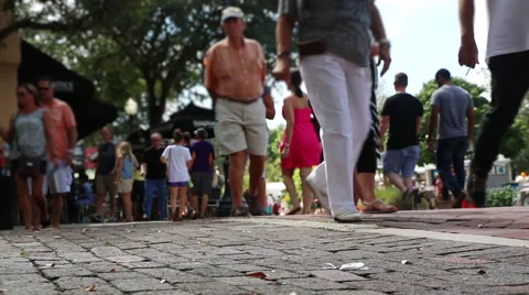 Pedestrians in a small town Stock Footage 55868660